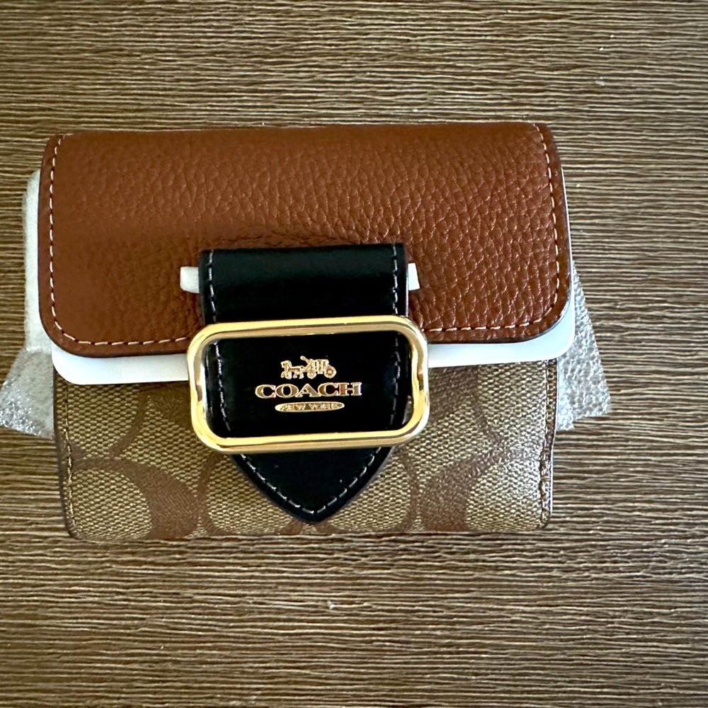 New unused Coach black and brown stylish wallet